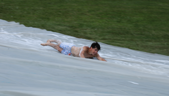 Another student going down the slide