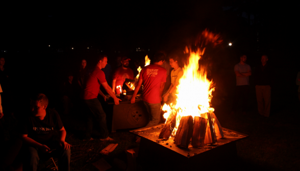 Students around a bonfire