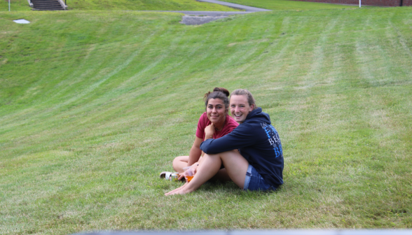 Two of the prefects sitting on the grass