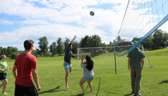 The volleyball game: sending the ball over the net