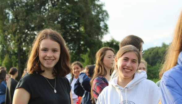 Some students smile for the camera