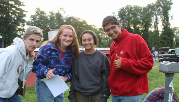 Four prefects pose afront the snack bar