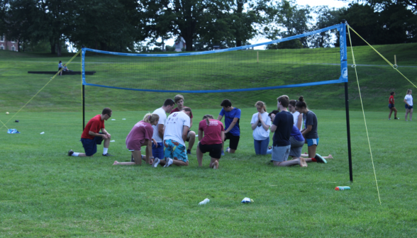 Students play volleyball