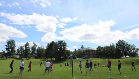 Students play volleyball