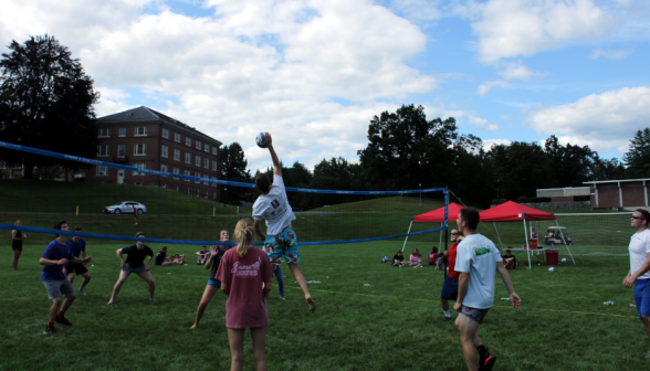 Students play volleyball