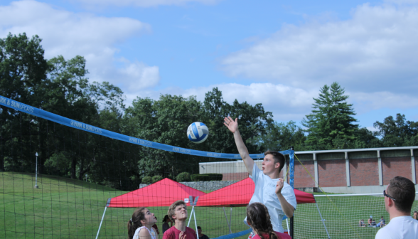 Students play volleyball