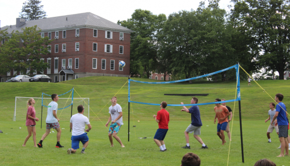 Students play volleyball