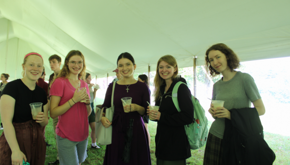 Five students pose for a picture, root beer floats in hand