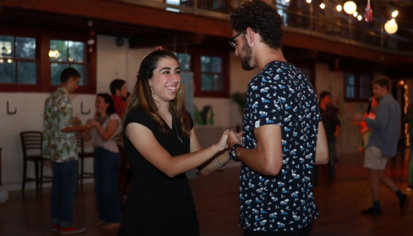 A pair of freshmen dancing