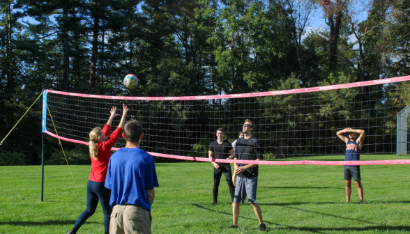 Students play volleyball