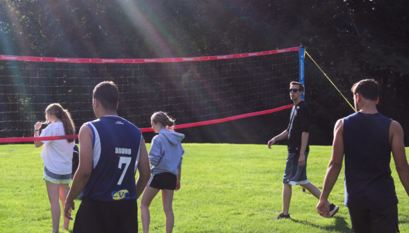 Students play volleyball