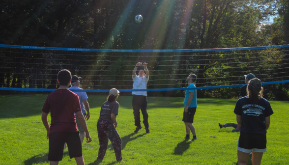 Students play volleyball