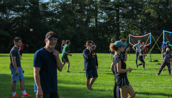 Students play volleyball