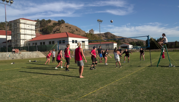 Students playing volleyball