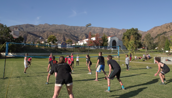 Students playing volleyball