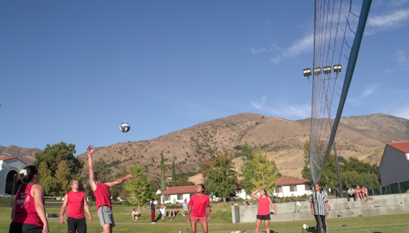 Students playing volleyball