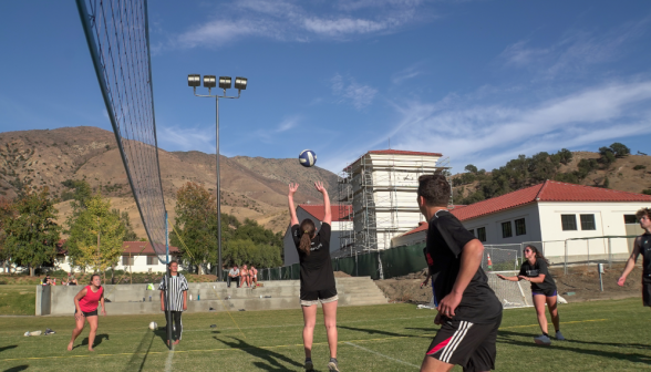 Students playing volleyball