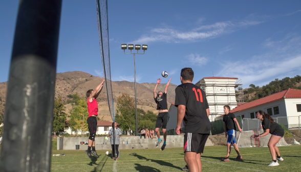 Students playing volleyball