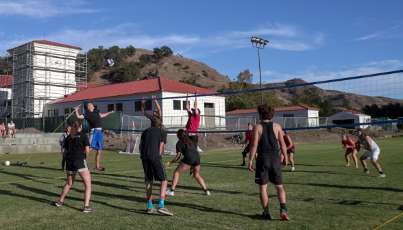 Students playing volleyball