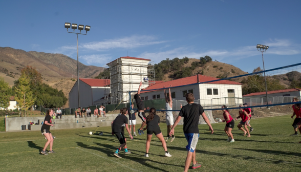 Students playing volleyball