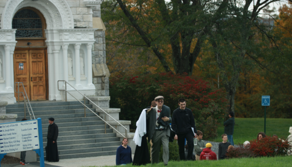 Students walk out from the chapel after Mass