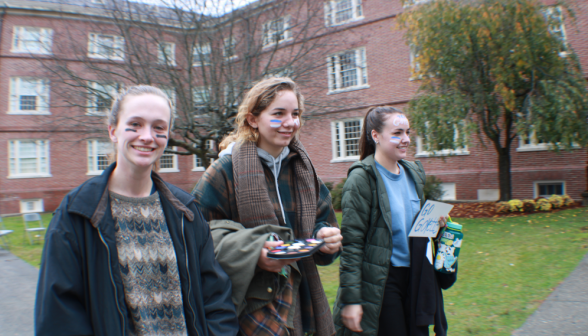 Students at pumpkin-carving party