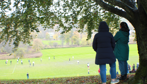 Students watch soccer game