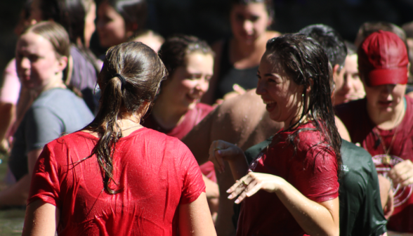 Students laugh and talk post splash fight