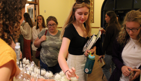 A student selects one of the drinks