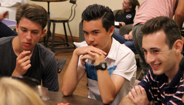 Three students at a table