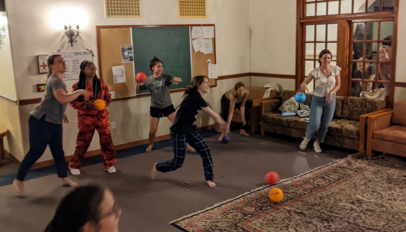 Dorm dodgeball: despite severe attrition, the left team plays with enthusiasm