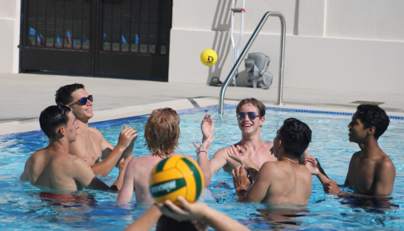Seven students prepare to play water polo