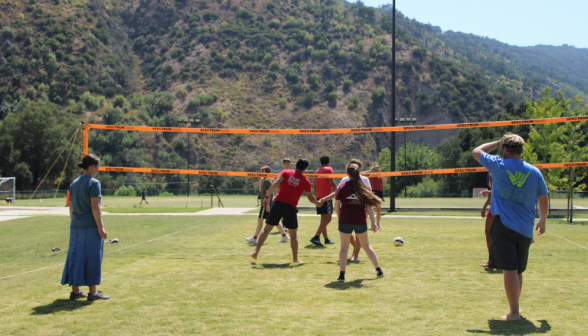 Another shot of volleyball on the grass court