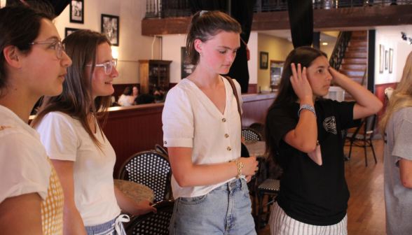 A group of programmers inside a cafe