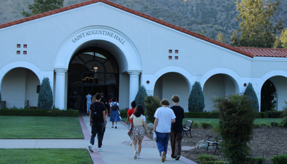 Students walk toward St. Augustine Hall
