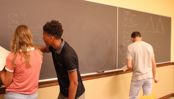 On the left, two students practice prop 10; on the right, a student studies prop 4