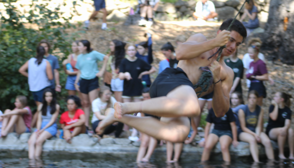 A student tries the rope swing