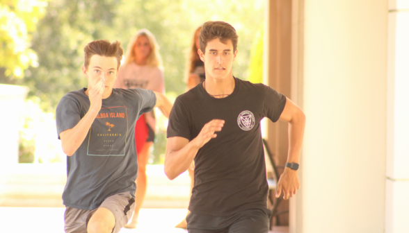 Two students running