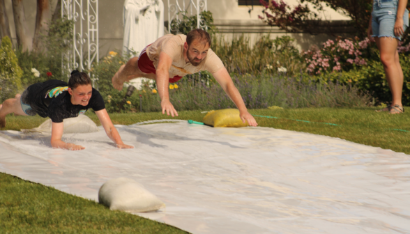 Two go down the slide