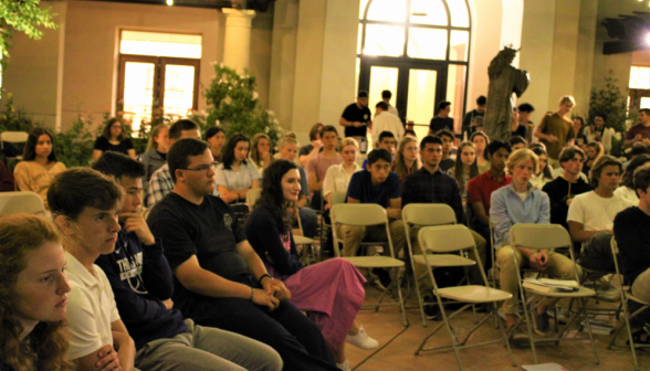 Another picture of the students listening to Fr. Walshe