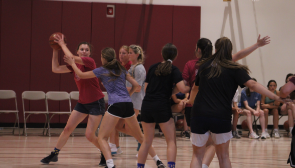 A student prepares to pass, while heavily guarded