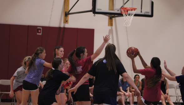 A student shoots for the hoop