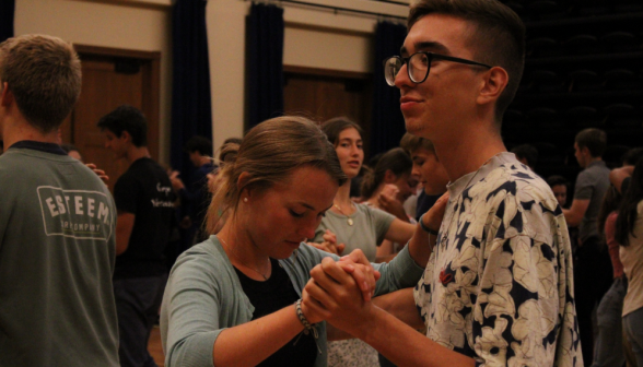 Two other students dancing