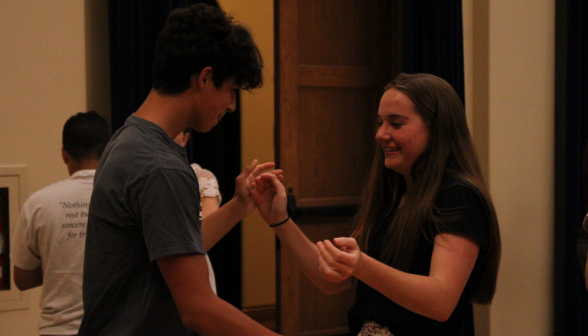 Another two students dancing