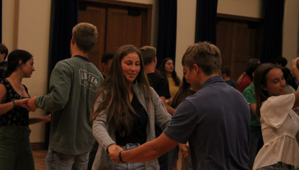 Two students dancing