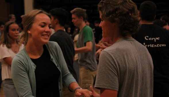 Two students swing dancing