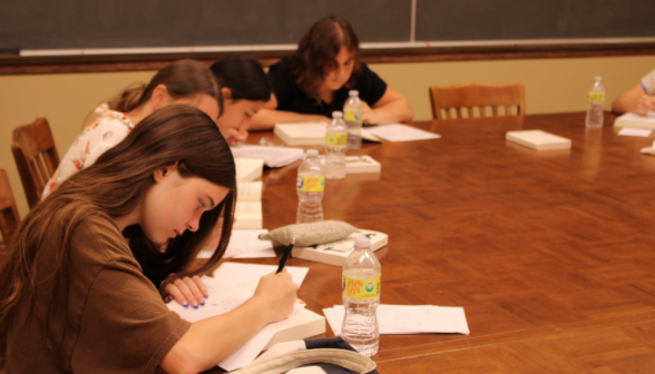 A row of studying students