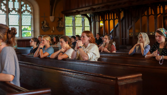 Students praying the Rosary in the Chapel