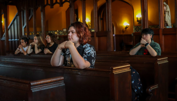 Students praying the Rosary in the Chapel