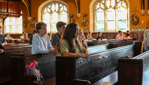 Students praying the Rosary in the Chapel